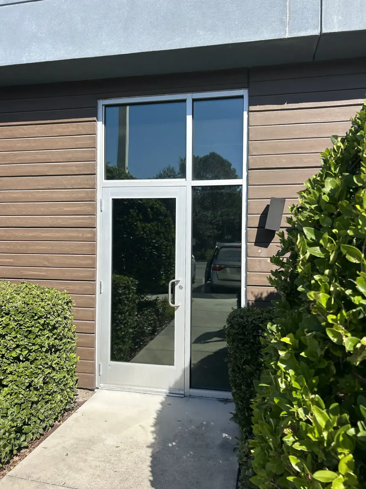 Summit Window Tinting commercial install — Lobby · gradient frost band