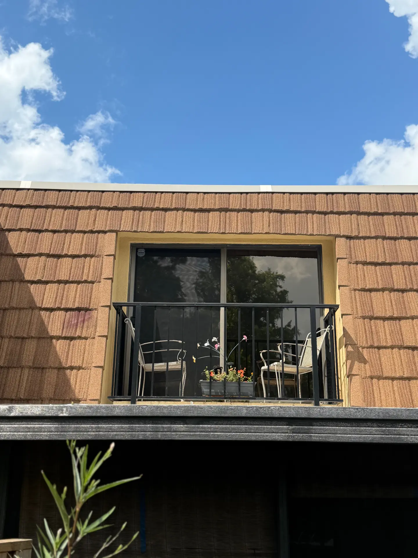 Summit Window Tinting residential install — Balcony slider · glare & heat control