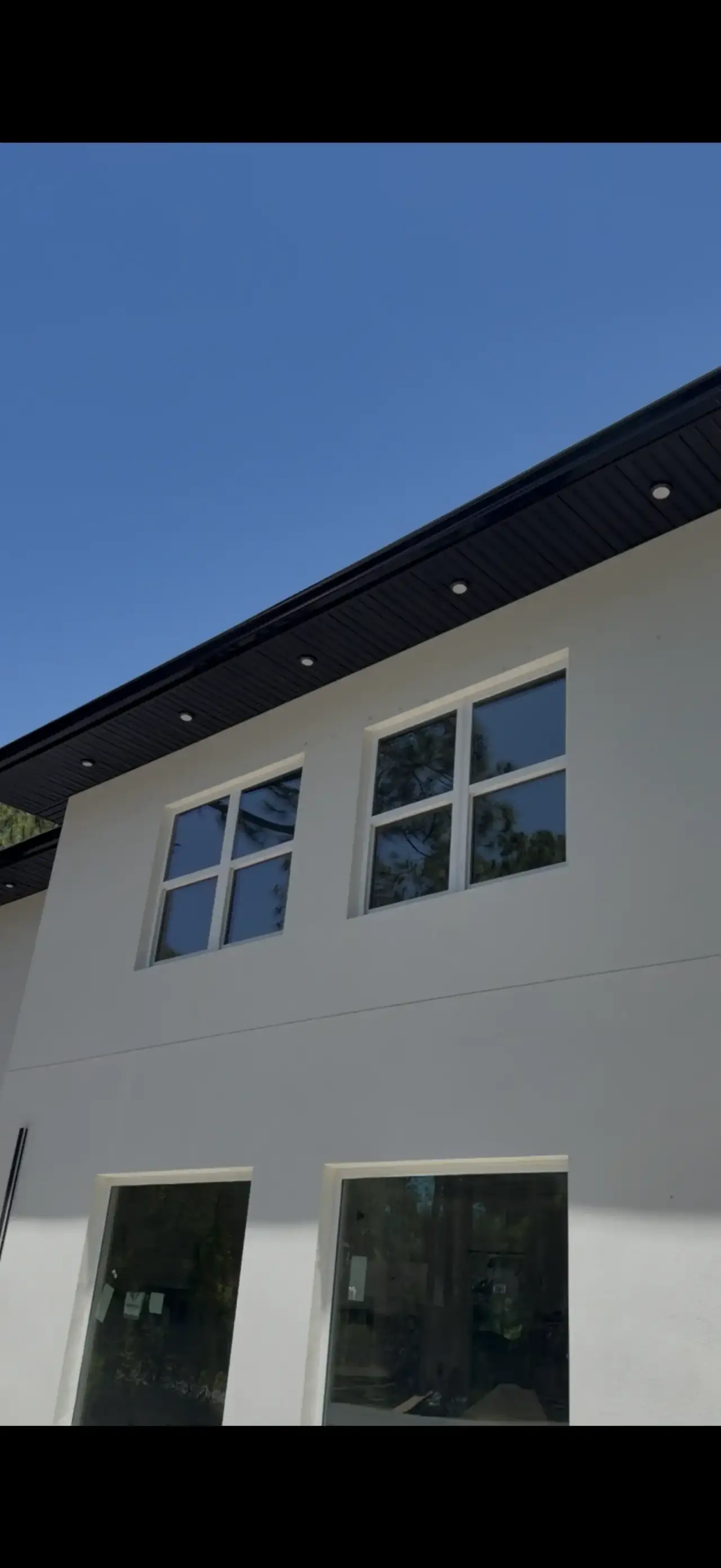 Summit Window Tinting residential install — Lanai · heat-rejection film
