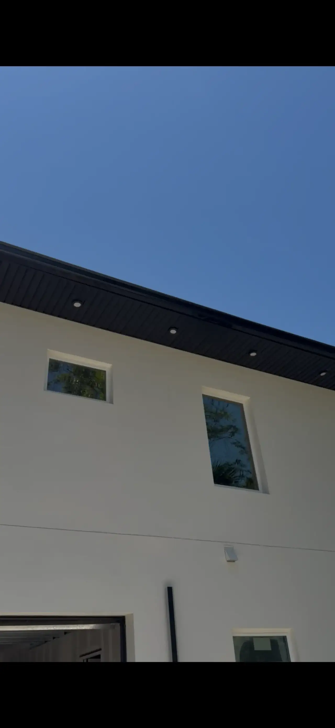 Summit Window Tinting residential install — Living room · TrueVue glare control